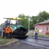 На вулиці Хлібопекарській вкладають асфальтобетонне покриття