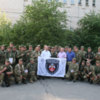 Головний поліцейський Чернігівщини відзначив спецпризначенців, а вони подарували йому прапор з автографами